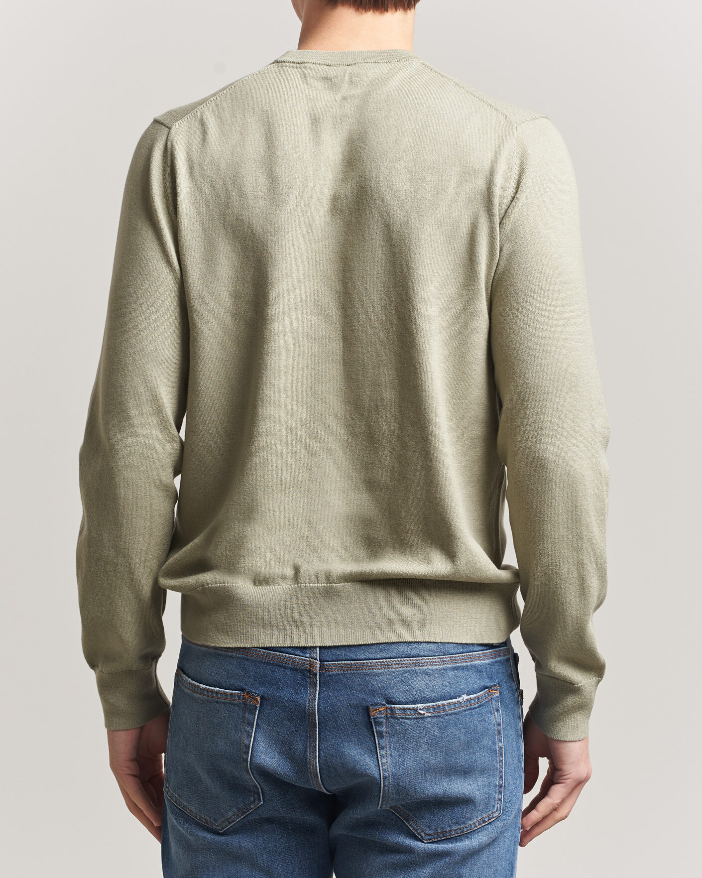 Hombres | Jerséis y prendas de punto | Filippa K | Cotton Merino Knitted Sweater Light Green