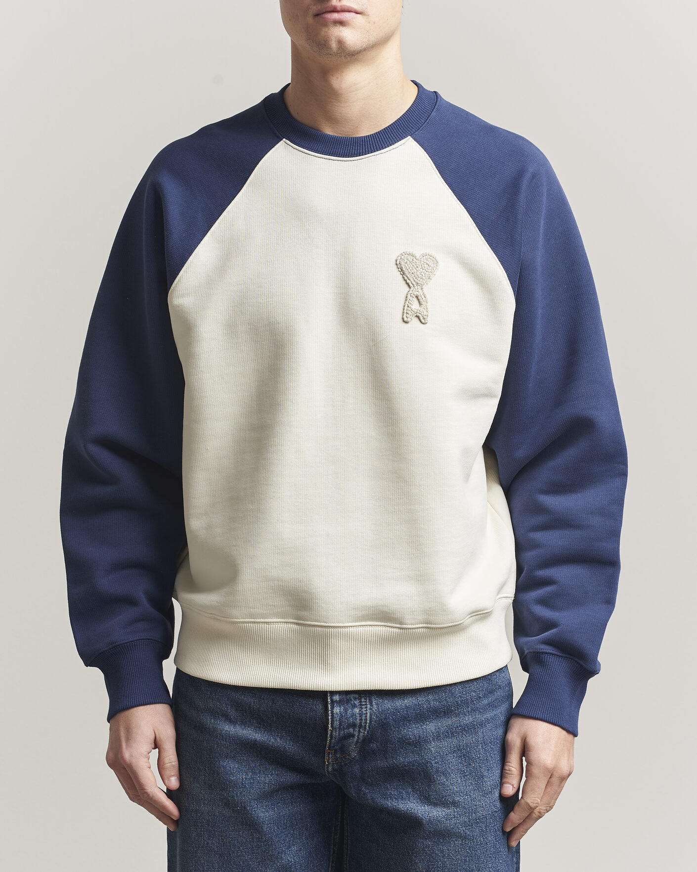 Hombres | Jerséis y prendas de punto | AMI | Knitted Heart Logo Sweatshirt Creme/Navy