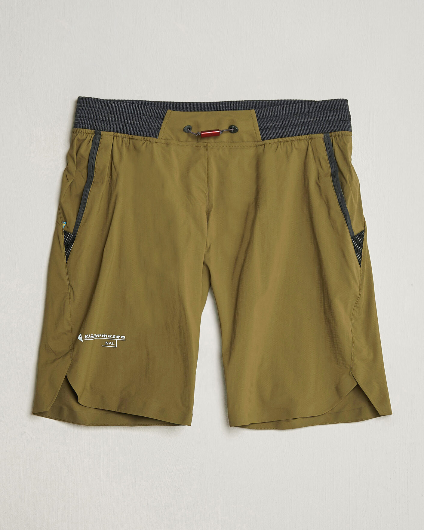 Hombres | Pantalones cortos | Klättermusen | Nal Windbreaker Shorts Olive