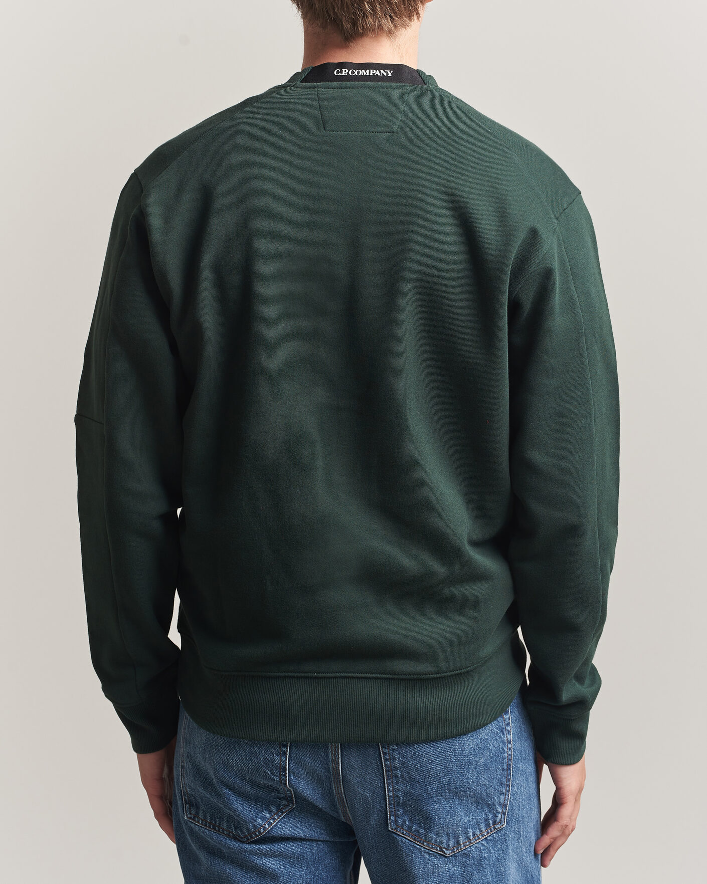 Hombres | Jerséis y prendas de punto | C.P. Company | Diagonal Raised Fleece Lens Sweatshirt Emerald Green