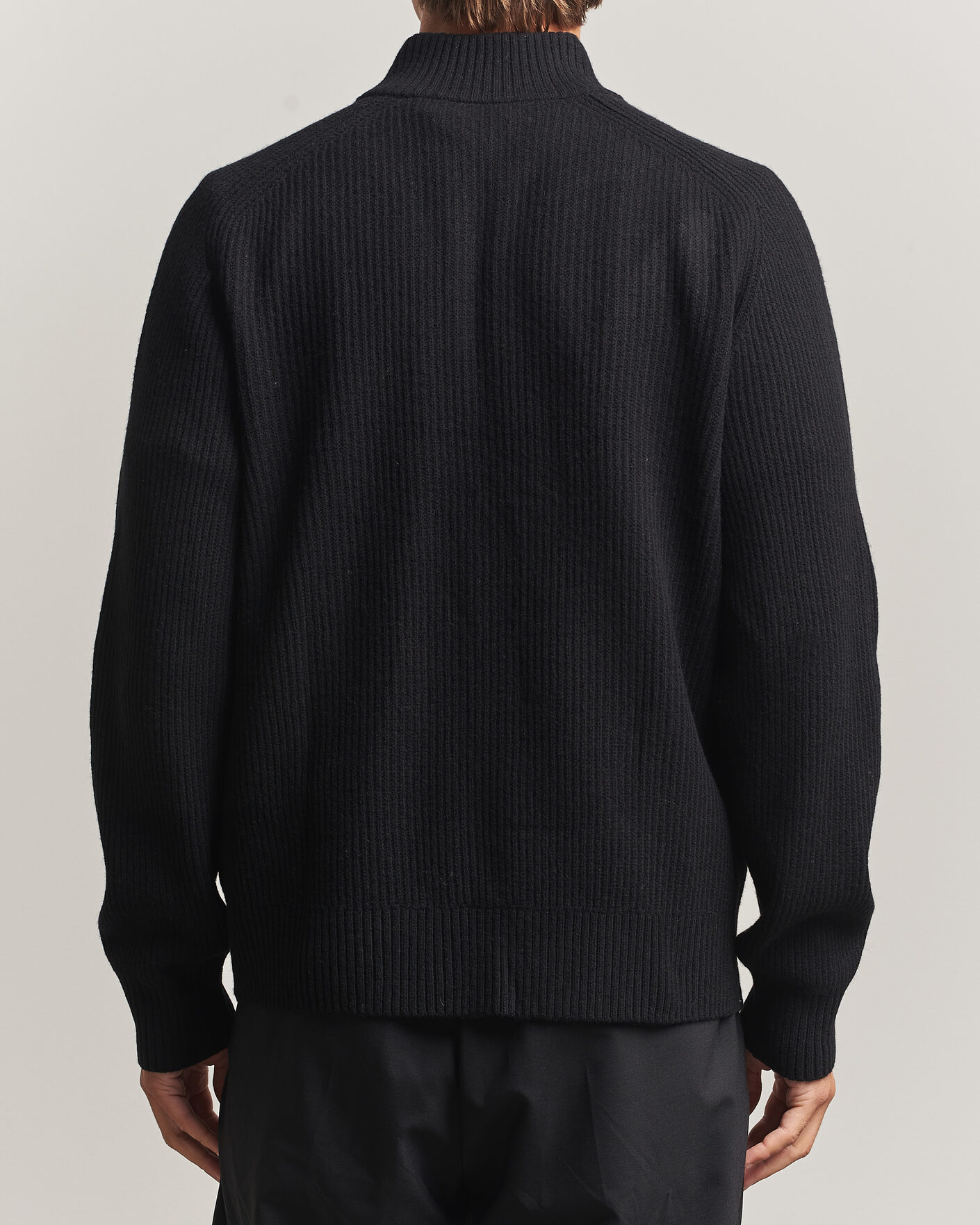 Hombres | Jerséis y prendas de punto | Filippa K | Ribbed Wool Knitted Half Zip Black