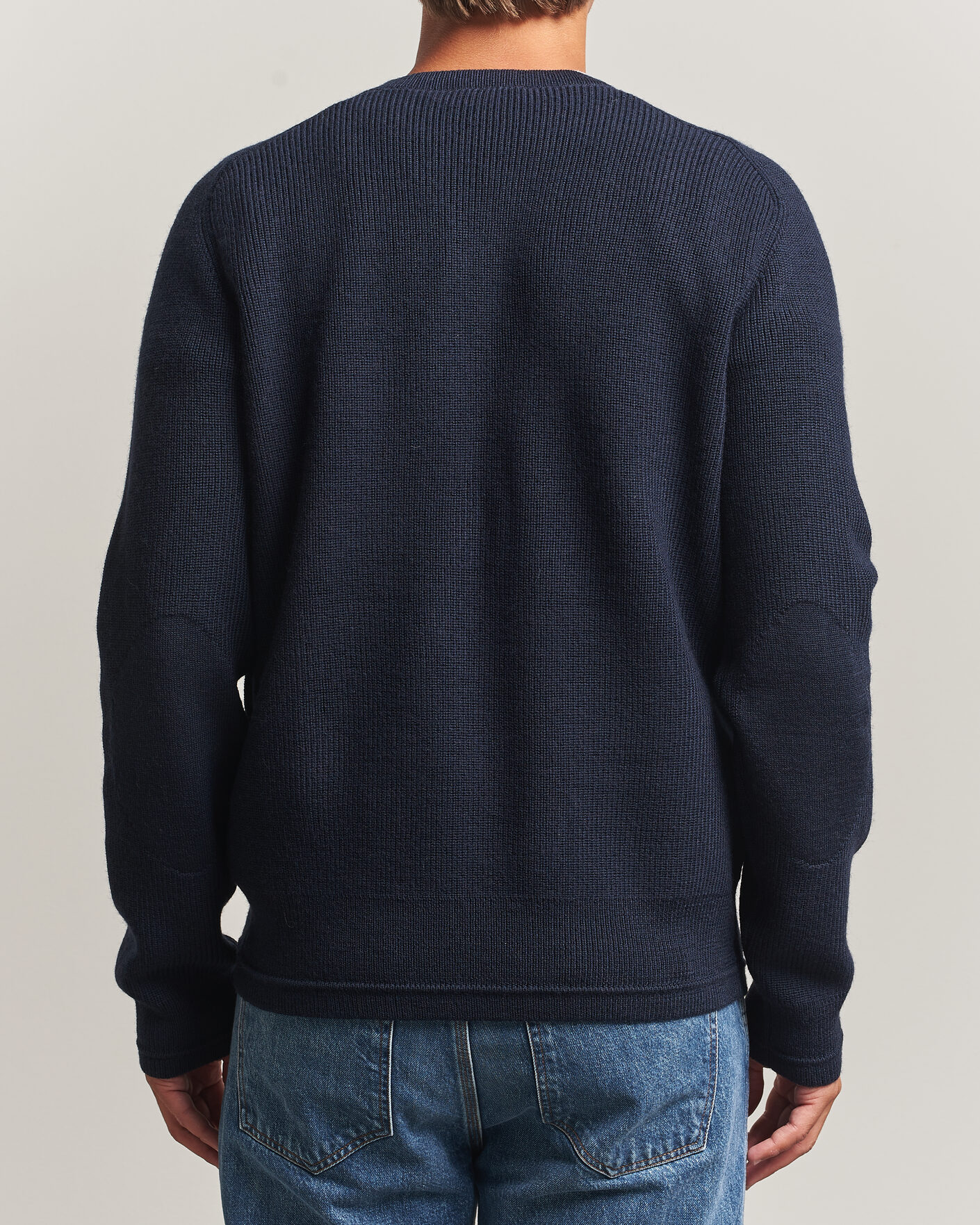 Hombres | Jerséis y prendas de punto | Tiger of Sweden | Logan Wool Knitted V-Neck Night Grape