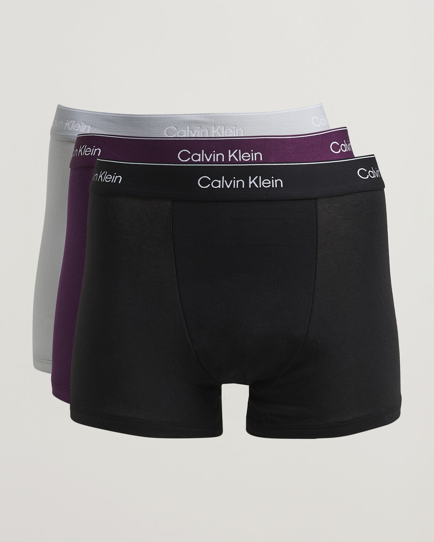 Hombres | Ropa interior y calcetines | Calvin Klein | 3-Pack Icon Cotton Stretch Relaxed Trunk Black/Grey/Purple