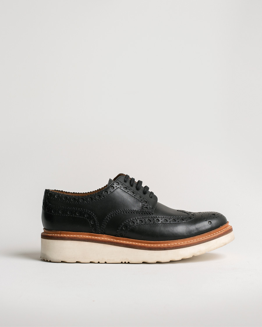 Hombres | Grenson Archie Brogue Derby Wedge Sole Black Calf | Pre-owned | Grenson Archie Brogue Derby Wedge Sole Black Calf