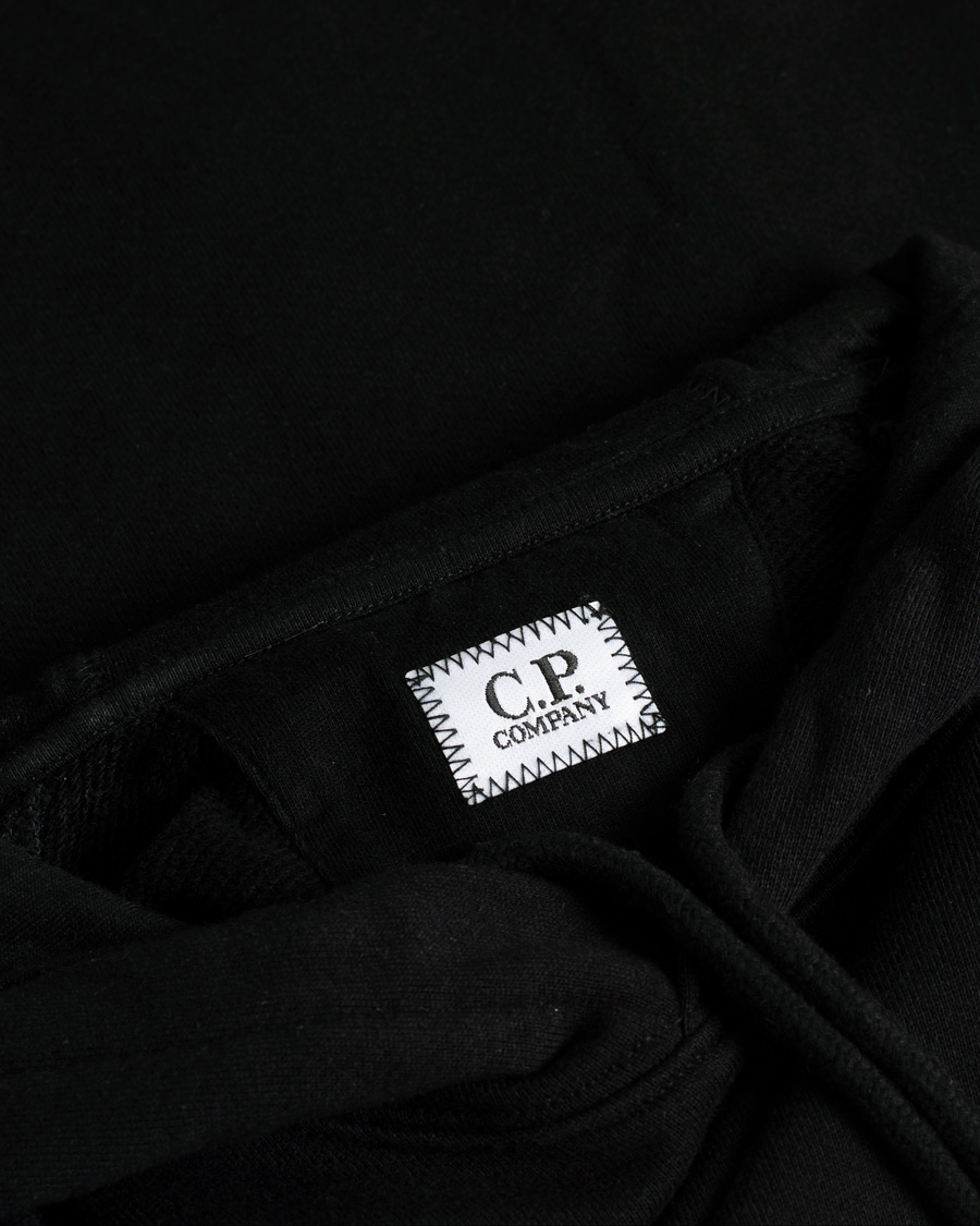 Hombres | Jerséis y prendas de punto | Pre-owned | C.P. Company Diagonal Raised Fleece Hooded Lens Sweatshirt Black