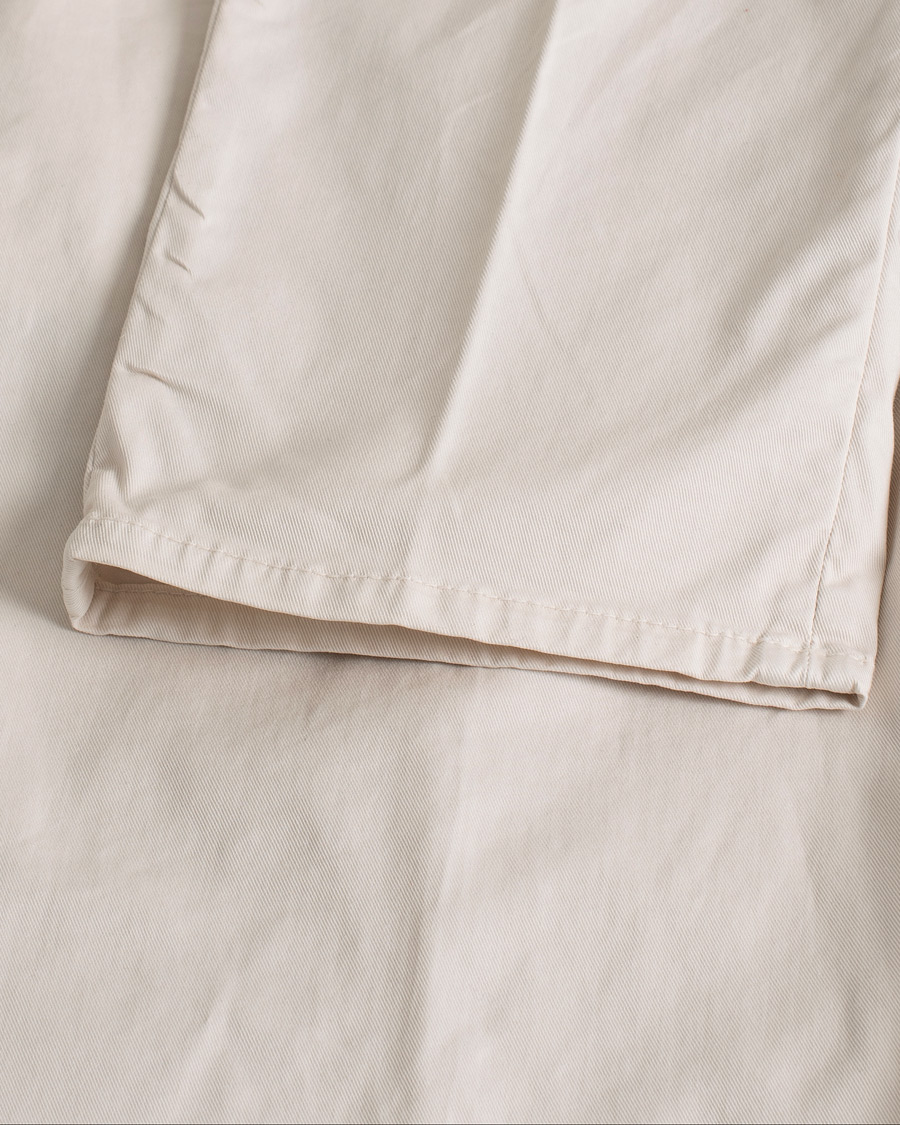 Hombres | Pantalones | Pre-owned | Brunello Cucinelli Slim Fit Pleated Trousers Off White