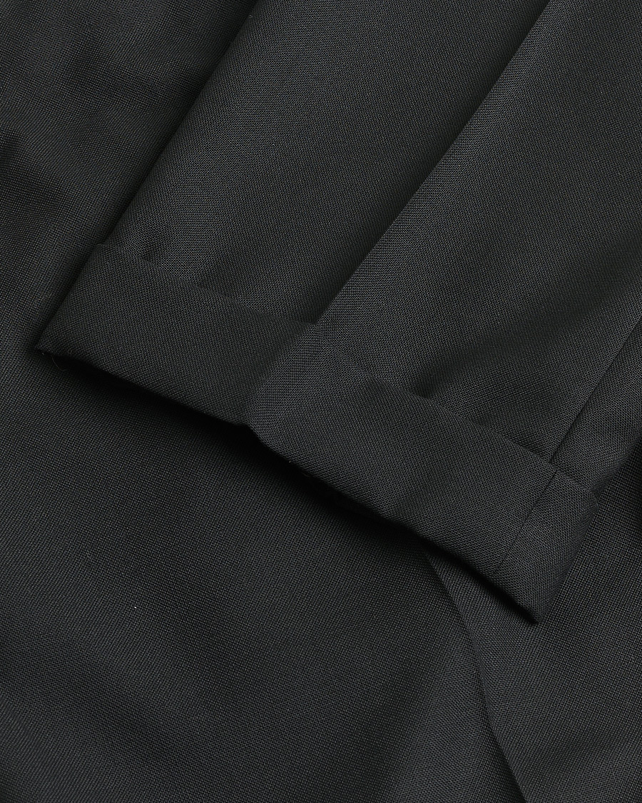 Hombres | Pre-owned Pantalones | Pre-owned | Berg&Berg High Waisted Double Pleated Wool Trousers Black 52